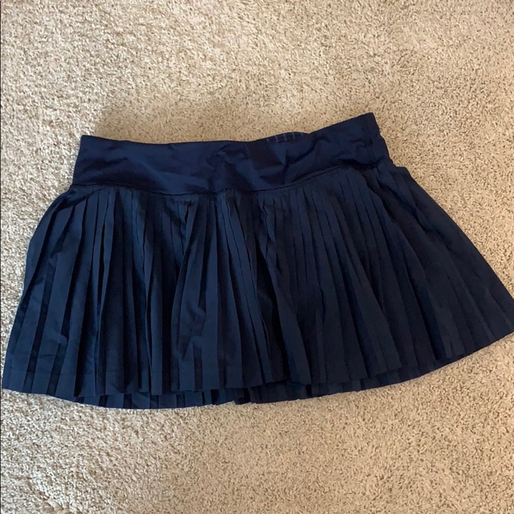 Navy blue pleated Lululemon skirt